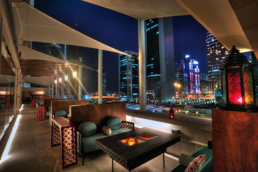 Bedroom with king bed and city view